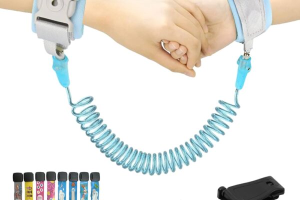 KidSafe OnceLock Wristband with a coiled, blue tether connecting two adjustable wrist cuffs. The wristbands have secure, child-proof locks to prevent accidental release. The image also shows colorful replacement straps in various designs and a black attachment buckle.