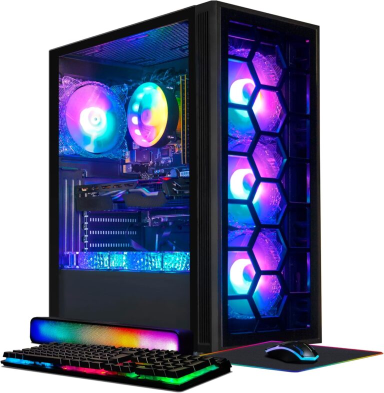 Gaming PC setup featuring a sleek black tower with hexagonal front panel design and vibrant RGB lighting illuminating internal components. Accompanied by an RGB keyboard, wrist rest, mouse, and mouse pad, all glowing with multicolored lights. Stgaubron