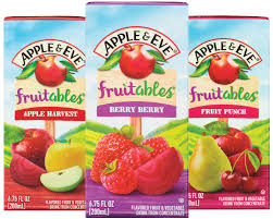 Three cartons of Apple & Eve Fruitable Juice boxes in different flavors: Apple Harvest, Berry Berry, and Fruit Punch. Each carton displays colorful fruit imagery corresponding to the flavor.