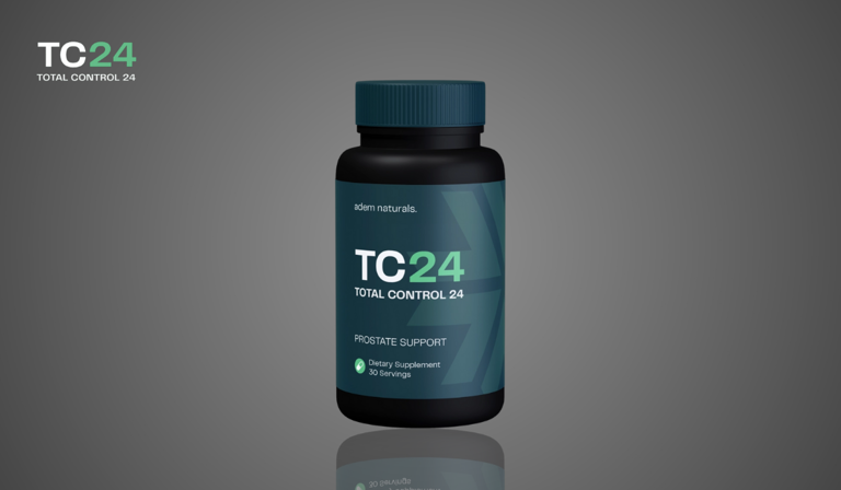 A black supplement bottle labeled 'TC24 Total Control 24' by Adem Naturals, designed for prostate support. The label includes text 'Dietary Supplement, 30 Servings' and features a sleek dark teal and black color scheme, with the bottle reflected on a gradient gray background.