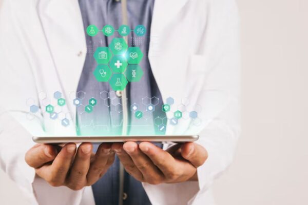 Doctor holding a tablet with digital healthcare icons representing Doctiplus features like telemedicine, EHR, and medical data integration.