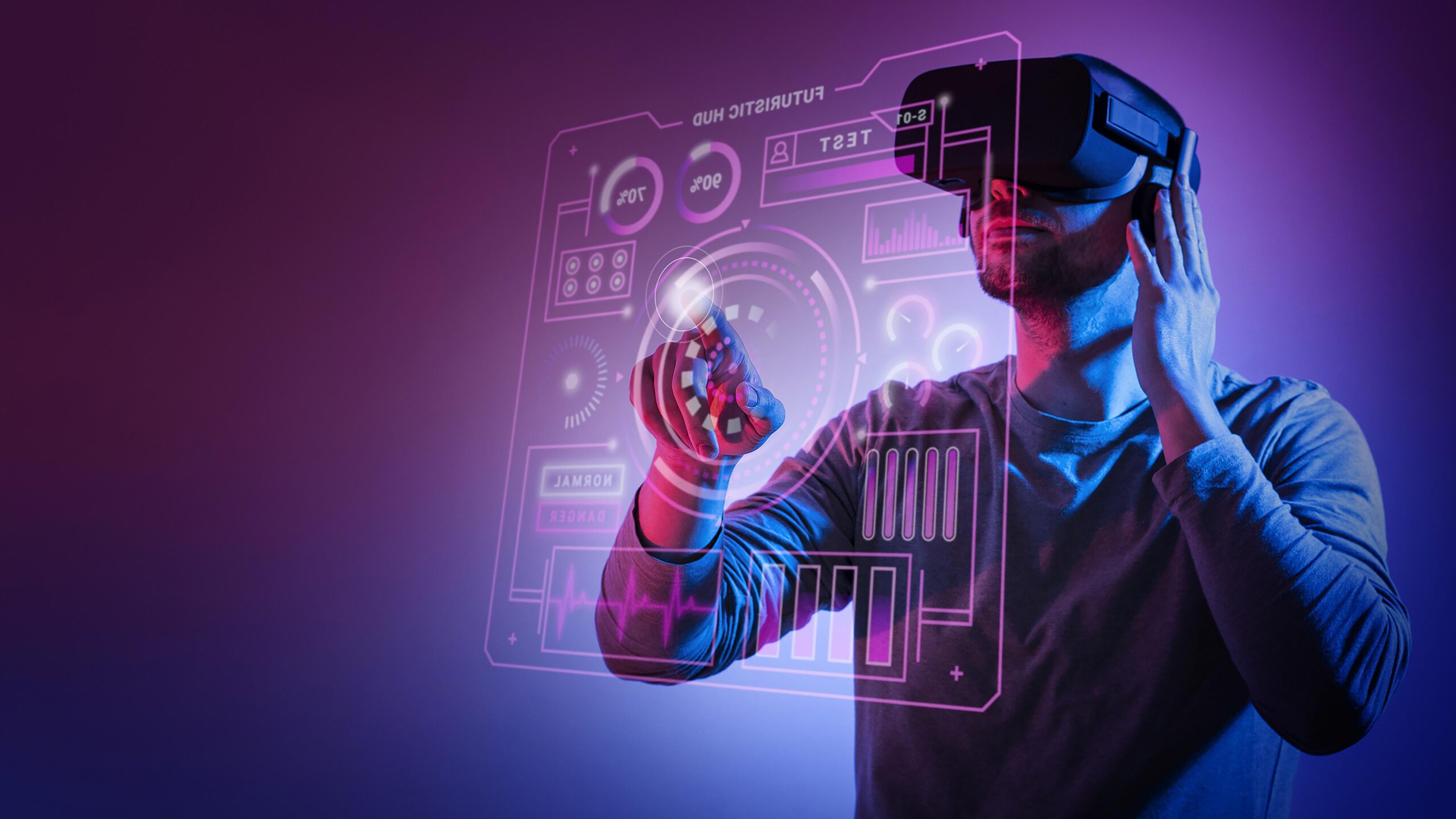 A man using a futuristic virtual reality interface with holographic controls, symbolizing Starhoonga’s innovative role in AI, immersive tech, and the future of human-computer interaction.